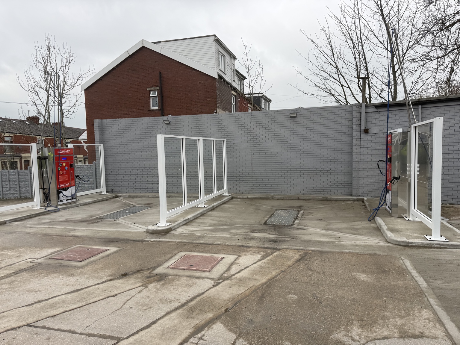 Completed twin-bay self-service jet wash conversion